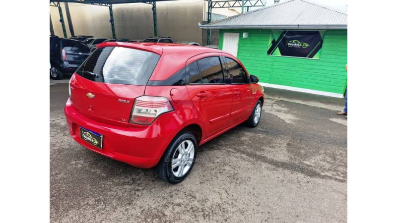 CHEVROLET - AGILE - 2010/2011 - Vermelha - R$ 34.500,00