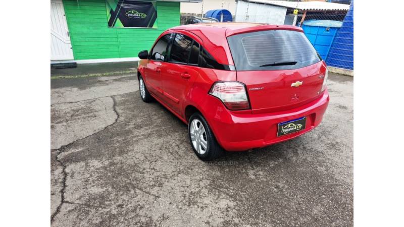 CHEVROLET - AGILE - 2010/2011 - Vermelha - R$ 34.500,00